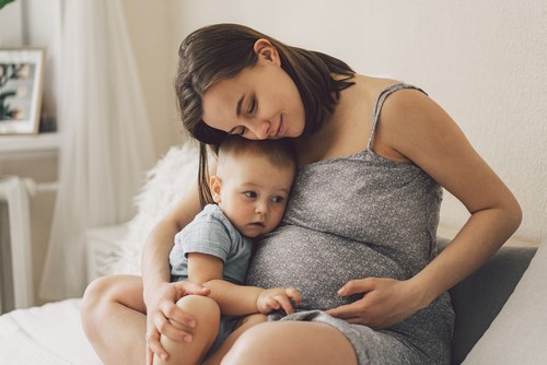 Shutterstock 1950452932 PREGNANT MOM AND CHILD